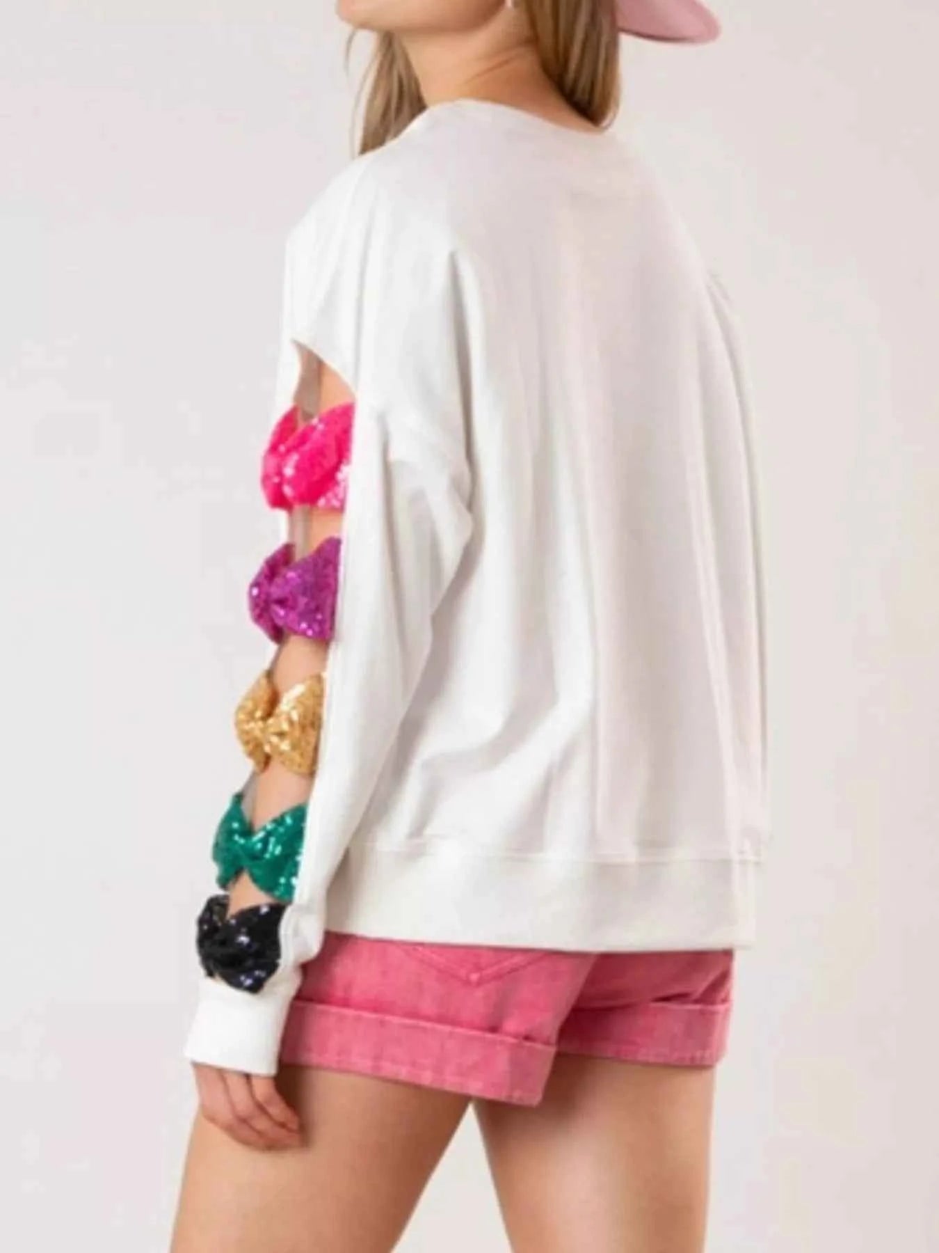 Sequin Bow Cutout Round Neck Sweatshirt